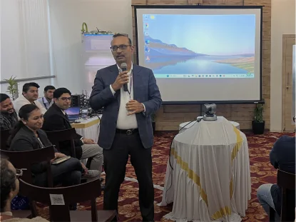 A QKTech leader speaking to colleagues at a Leadership Connect session